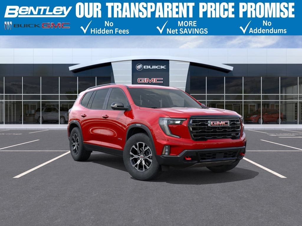 2026 GMC Acadia AT4 in Volcanic Red Tintcoat — front three-quarter view