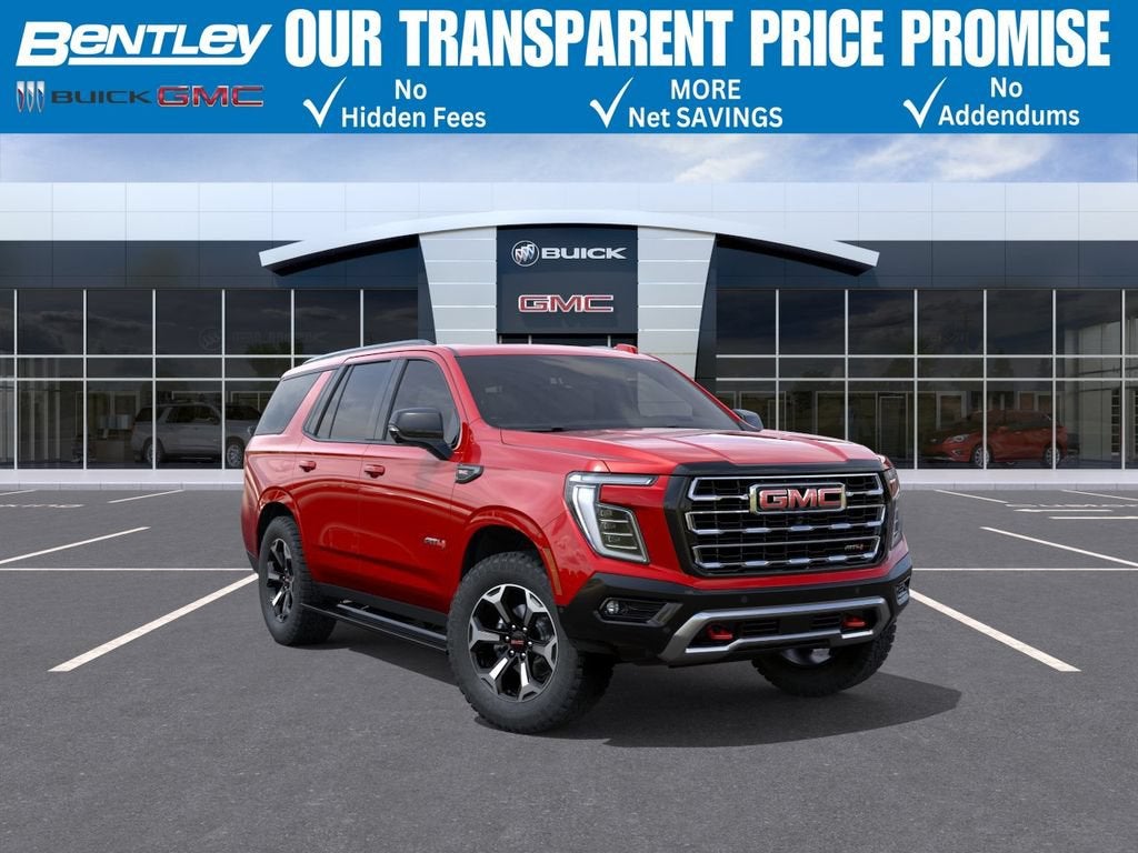 2026 GMC Yukon AT4 in Volcanic Red Tintcoat — front three-quarter view