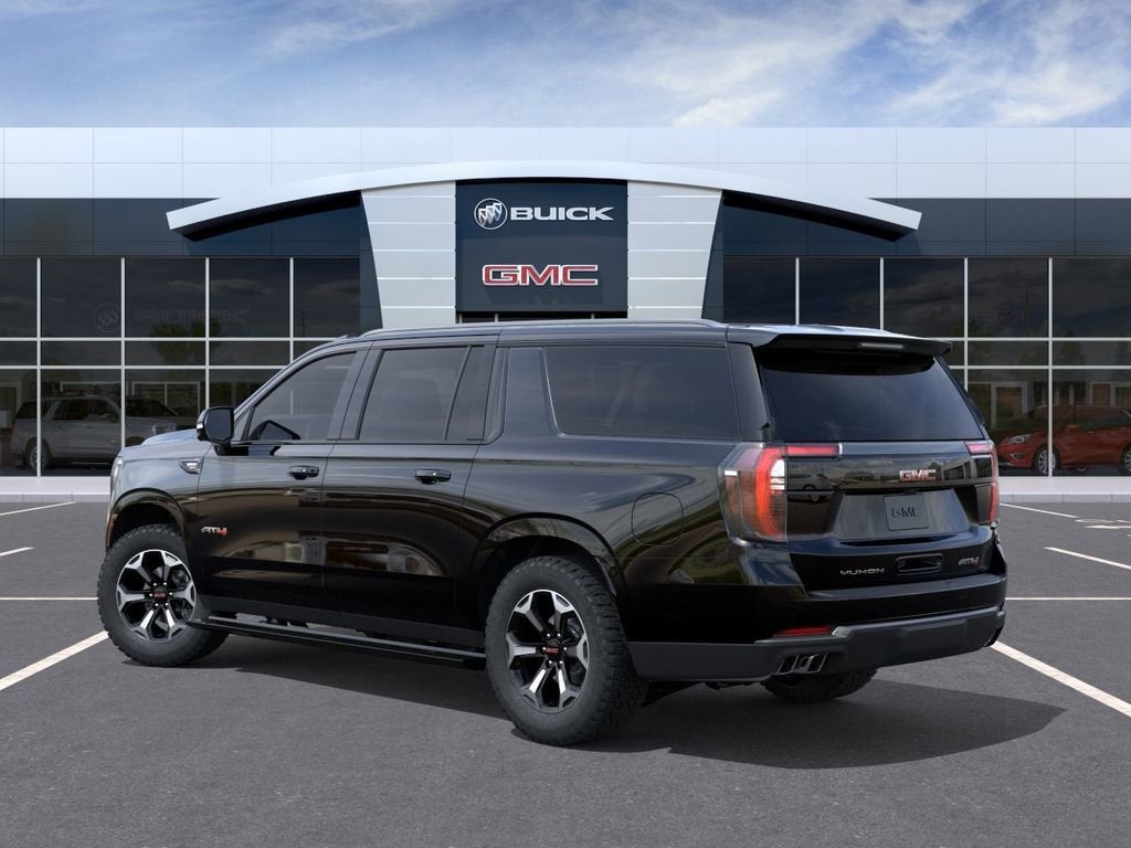 2026 GMC Yukon XL — rear three-quarter view