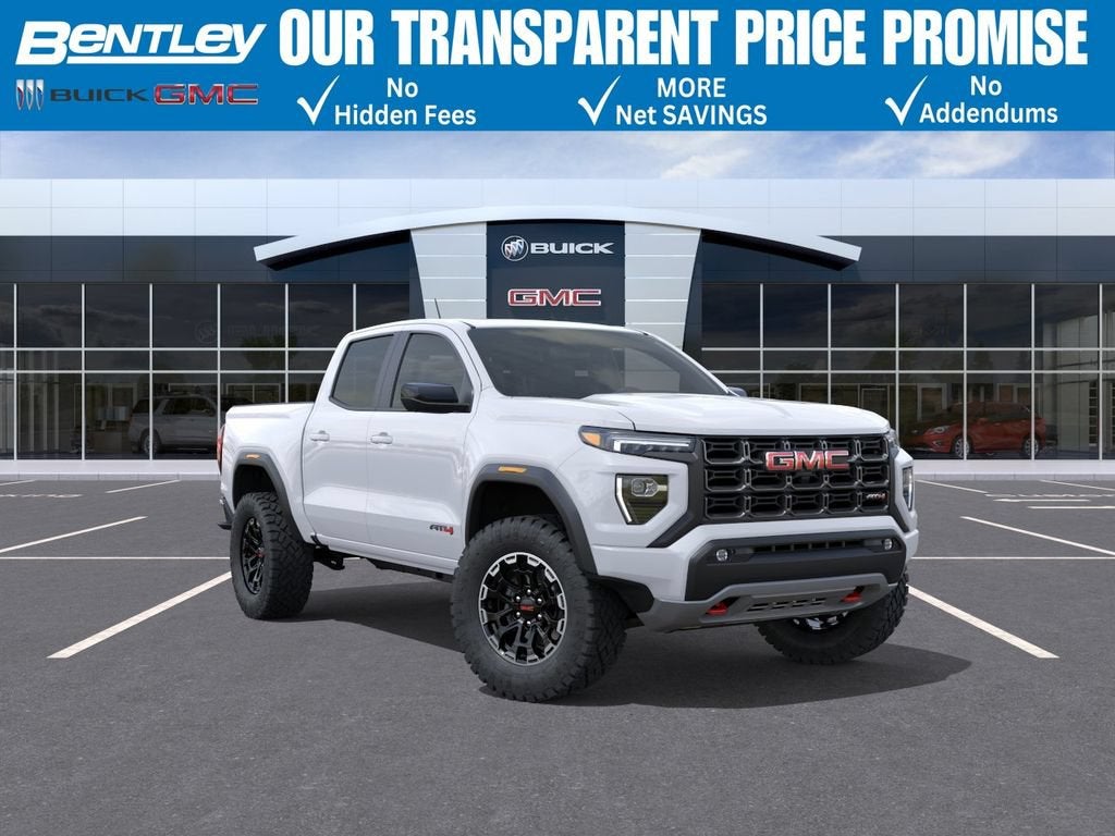 2026 GMC Canyon AT4 in Summit White — front three-quarter view
