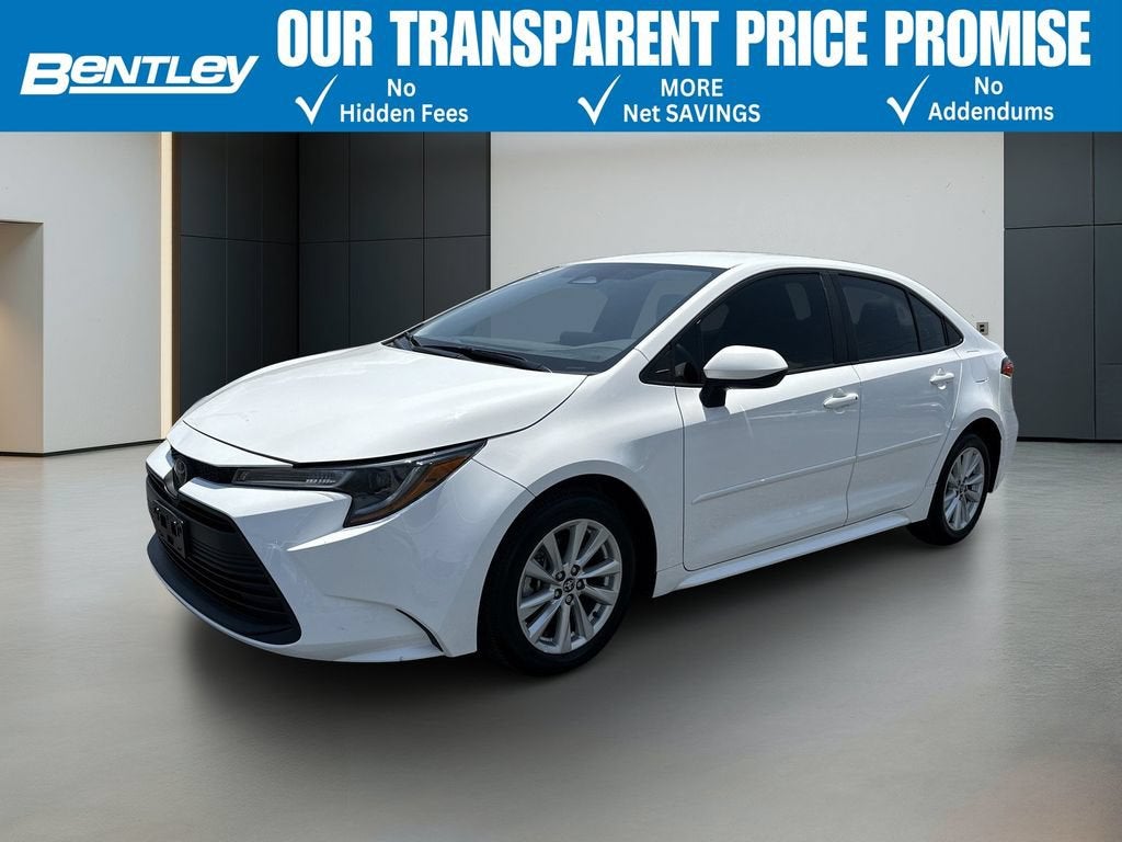 2024 Toyota Corolla LE in White — front three-quarter view