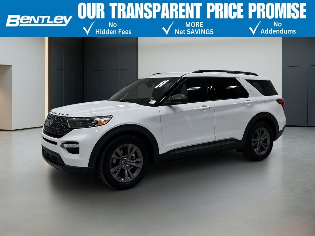 2021 Ford Explorer XLT in Oxford White — front three-quarter view