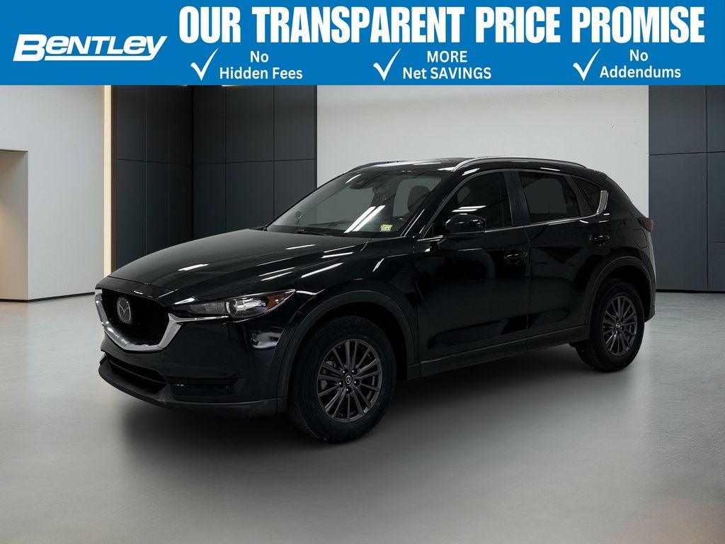 2020 Mazda Mazda CX-5 Touring in Jet Black Mica — front three-quarter view